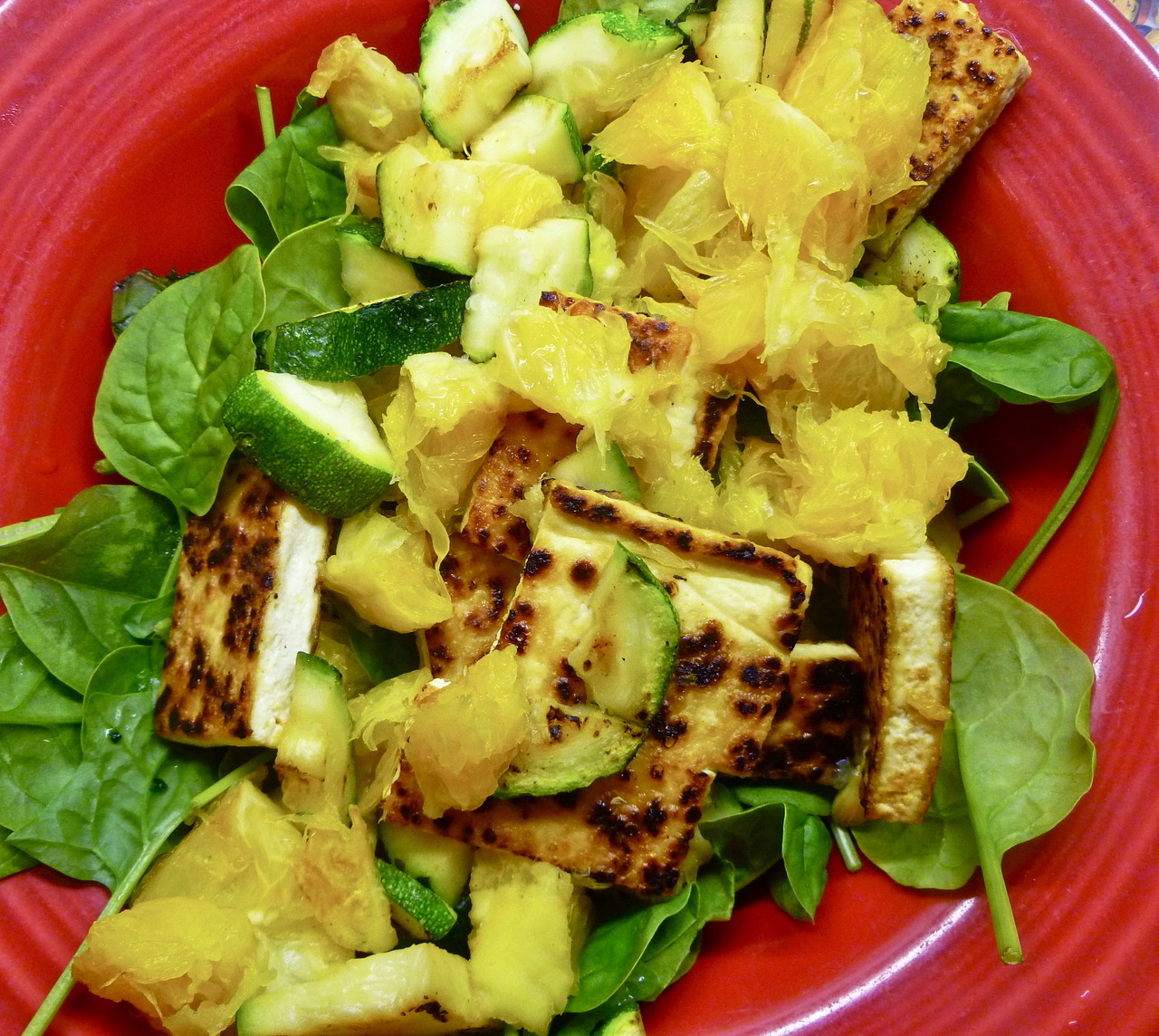 lovely lunches: pan fried tofu and zucchini with orange bits and spinach
*this was my first time making tofu! thanks to Oh She Glows for the simple how-to!