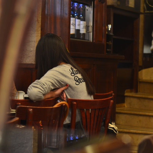 a girl at the Café de Flore, Paris, 2012