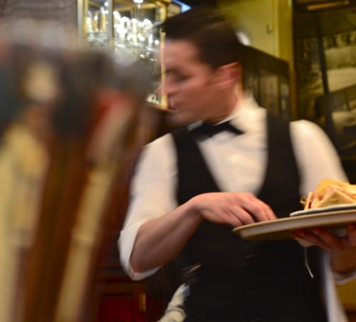 a waiter in the Café de Flore, Paris, 2012