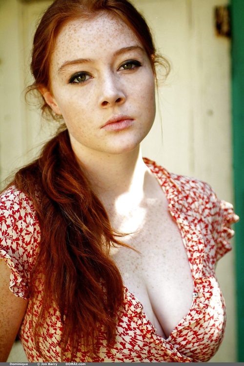 Curvy freckled redhead.