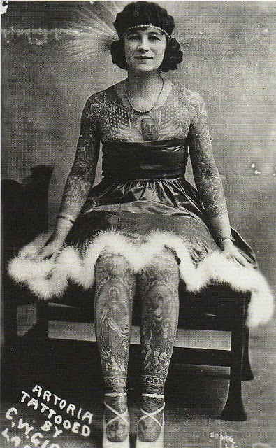 petit-poids:  Artoria Gibbons Artoria was a tattoo attraction that worked for 35 years in circus and carnival sideshows. Artoria was the stage name for Mrs. C. W. (Red) Gibbons.Artoria was born on a farm in upper Wisconsin. Her parents were poor and by