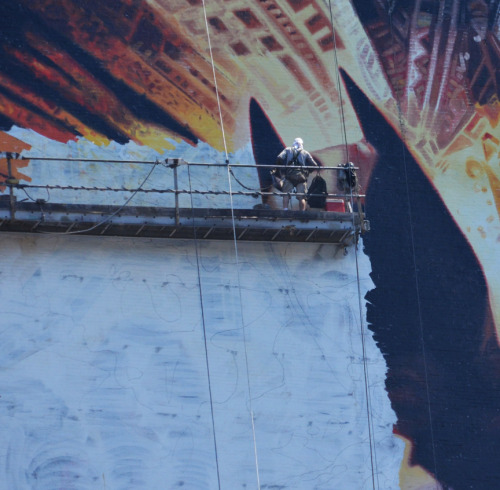 carmeljoy:brain-food:This is How You Paint a 150 Foot Tall Batmanby Irene Gallo315 Park Avenue South