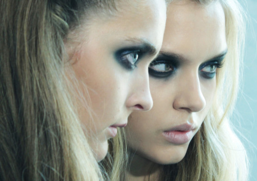 tmagazine:  Seeing double: Dark eyes backstage at Rodarte’s spring 2012 show.