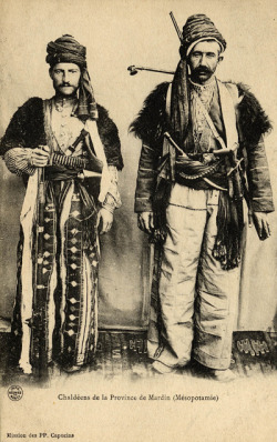 androphilia:  Chaldeans Of The Mardin Province (Mesopotamia) A 19th-century French postcard, edited by the Mission of the Capuchin Fathers, showing two Chaldean Christian men of the Mardin Province in Southeastern Turkey, along the Syrian border. 