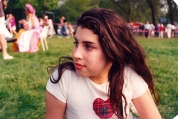 cigharete:  Amy Winehouse in her early teens, taken from Amy My Daughter by Mitch Winehouse, published by HarperCollins ‘A thoughtful Amy, still in pink and with her heart symbol of course, at her school summer fete’  