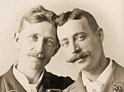 According to this adorable photograph, the secret of happiness is either growing a fine moustache, o