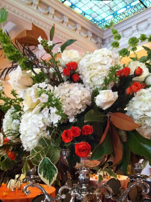 beautiful white + orange blooms at the MD Club for a wedding rehearsal dinner fete