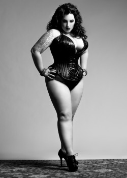 darkthor:  kerosenedeluxe:  ‘The world is mine’ Photographer: Andrea Hausmann Corset: Lovesick Corrective Apparel Model: me:)   Sexae!