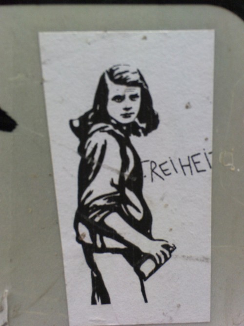 some graffiti art I saw in marburg, a town near frankfurt. it shows Sophie Scholl, a young student and resistance fighter, active within the ‘White Rose’ a resistance group in the 'Third Reich’. she and her brother Hans were executed. the writing...