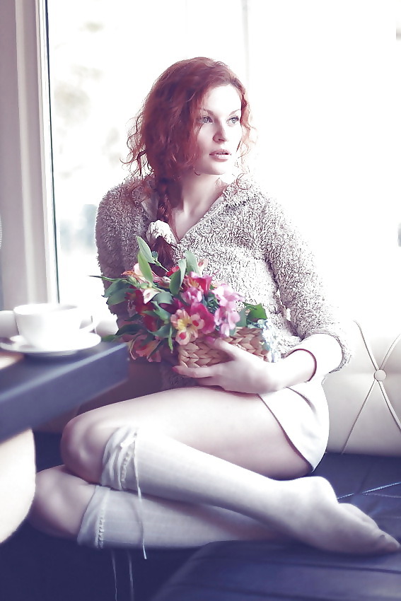Redhead with flowers.