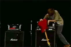  Thurston Moore demonstrates the correct way to have sex with your guitar. 