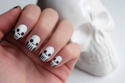 Start with a black, white & top coat.Base coat your nails in white & let them dryTake your b