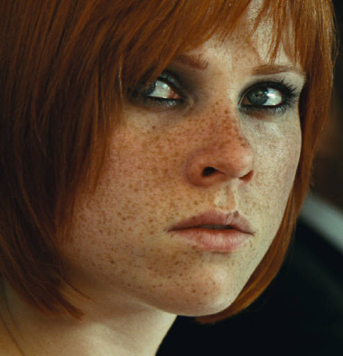 Young teen redhead with freckles