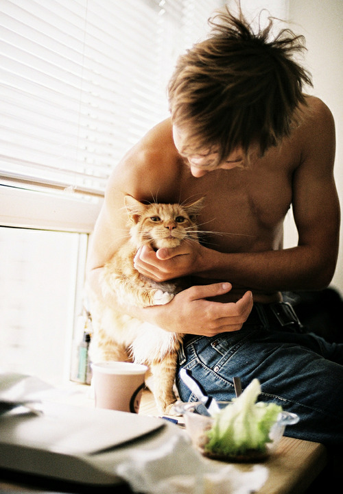 Cute guy with cat