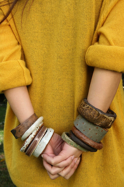 Things we love about this photo from Jujumade: 1) The perfect hue of that sweater. 2) The bangles! More proof that when you accessorize, bigger can be better!