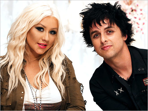 Huh? This is not a match we saw coming. Green Day’s Billie Joe Armstrong will be a mentor to Christina Aguilera’s team on the upcoming season of The Voice.
There aren’t any good Green Day/Xtina mashups on YouTube, but we’ll take any excuse to revisit...