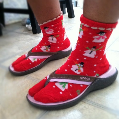 santini-houdini:  My mom keepin it extra G with the flip flops and socks   (Taken with Instagram)    Frosty The Snowman is Swealtering!!!  Very Ghetto!!!  