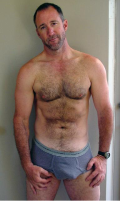 superhairywolfmen:  duncan66:  (via TumbleOn)  He may trim (not sure), but he’s a fucking sexy silver wolf … wish he were using me 