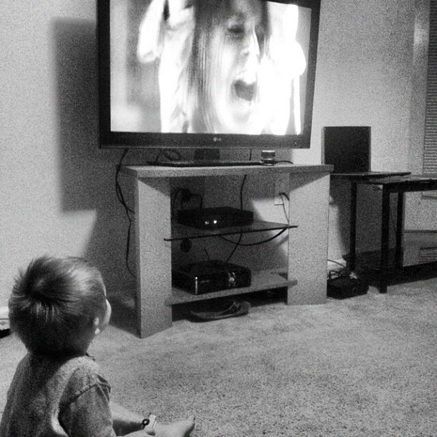 Just like daddy, loves horror movies. Watching Rites of Spring with me (Taken with