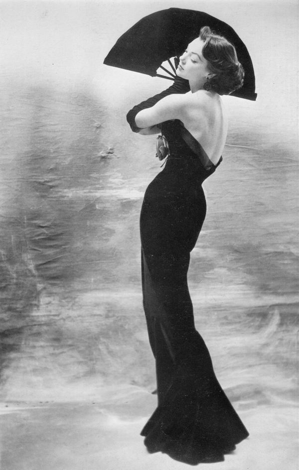 theniftyfifties:  Model Ivy wearing a gown by Maggy Rouff, 1953. Photo by Henry Clarke.