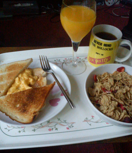 eurotrash-cutie:scrambled eggs on toast, special k with red berries, orange juice and a cuppa tea.. 