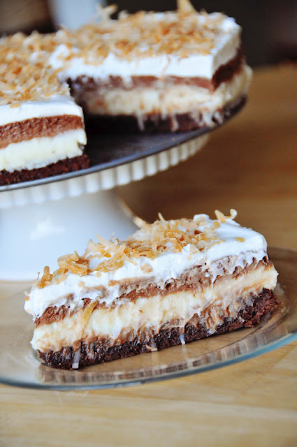 gastrogirl:  brownie bottom coconut chocolate cream cake. 