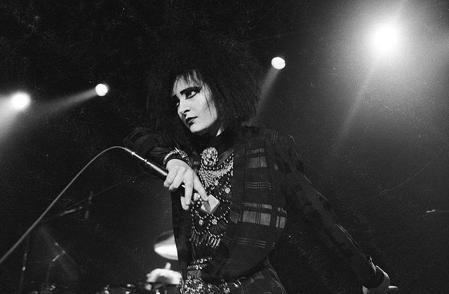 gorgonetta: [Two b/w photos of Siouxsie on stage]   