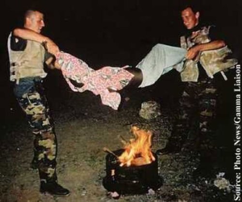 farhanist:  Something you would not have seen in the media: Two Belgian UN ‘peacekeepers’ cheerfully “roast” a Somali boy over a fire, during a ‘humanitarian mission’ in Somalia in 1993 Kurt Coelus and Claude Baert were part of the Unified