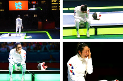 alfiejlim:  sumsandsigmas:  evredeen:  In the match that would decide who would fence for the gold, Germany’s Britta Heidemann landed a match-clinching touch. But was it in time? South Korea’s Shin A Lam didn’t think so. So she refused to leave.