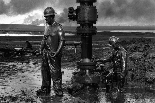 collective-history:Canadian Firemen sealing a blown oil well in Kuwait during the Gulf war, 1991. vi