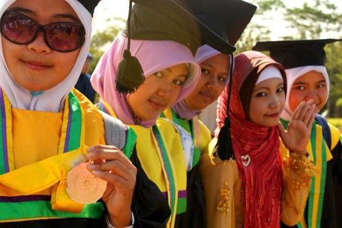 A group of girls celebrate at a Ramadan parade in Ngawi regency, East Java, Indonesia.  (photo by PC