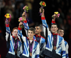 actionrigger:  Bronze medalists Daniel Purvis, Max Whitlock, Louis Smith, Kristian Thomas and Sam Oldham of Great Britain celebrate on the podium. →→ more Gymnastics