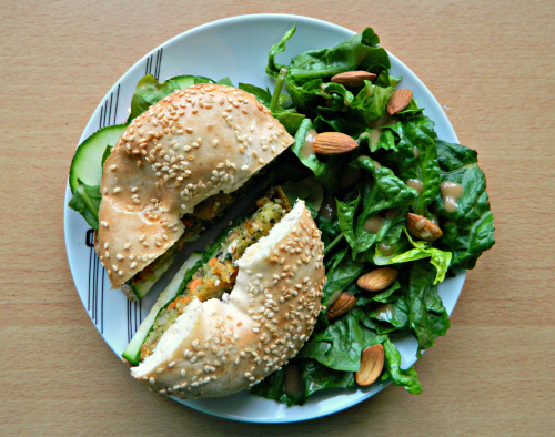 findmeunderneath:  seedsnsmiles:  -Toasted sesame seed bagel with hummus, courgette, spinach, nut cutlet and sweet chill sauce and a romaine & almond salad with a ginger/sesame dressing.  This sounds REALLY good… 