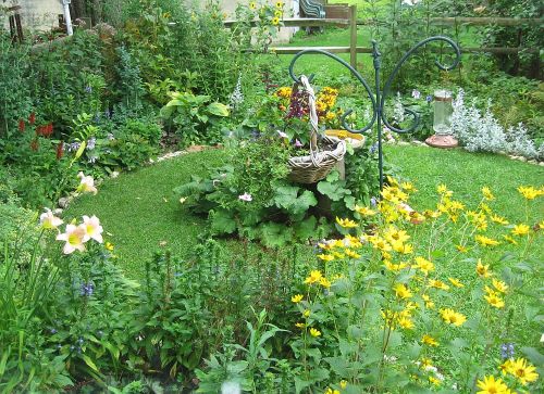 Haven&rsquo;t posted a picture of the garden for a while. The cardinal flowers, red on left, are dra