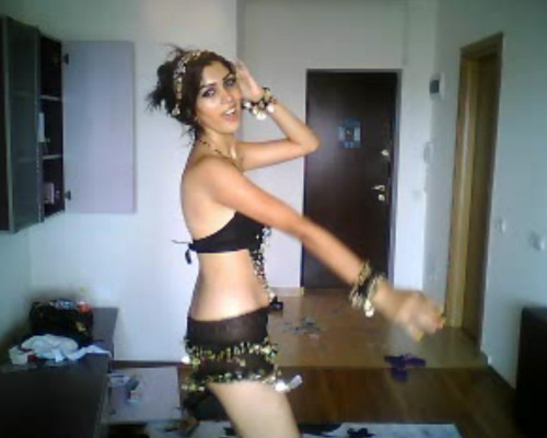 baccunalius:Hot Arab girl does a belly dance and ends up topless!!