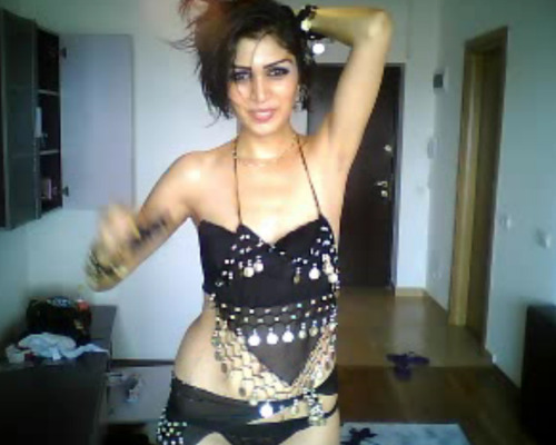 baccunalius:Hot Arab girl does a belly dance and ends up topless!!