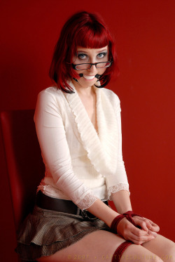 captiveculture:  bound and gagged student … don’t you love when a lovely redhead is watching you like this ? 