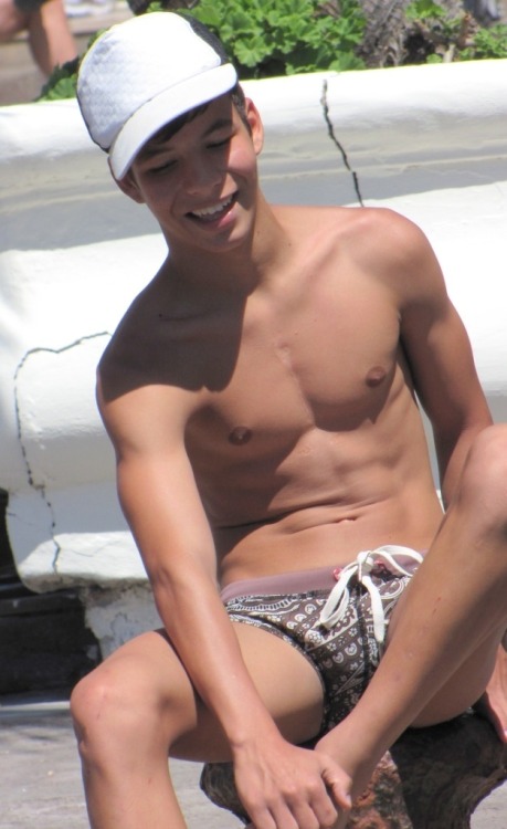 Cute smooth teen with Speedo and ball cap. porn pictures