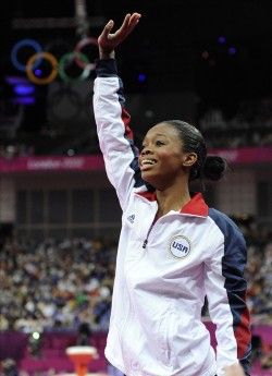 Gabby Douglas reacts to winning Gold in the