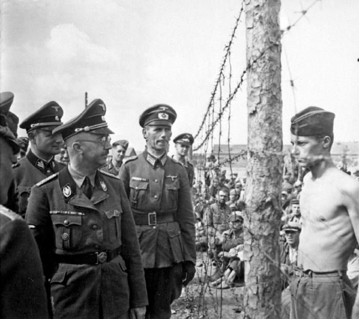 PoW Horace Greasley defiantly confronts Heinrich Himmler during an inspection of the camp he was confined in. Greasley also famously escaped from the camp and snuck back in more than 200 times to meet in secret with a local German girl he had fallen...