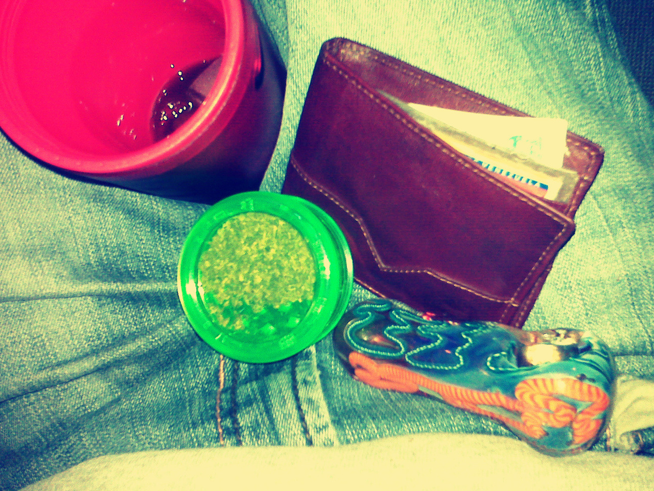 Everything I need on my lap! I got ma wallet, got ma weeed, got ma iced tea, got