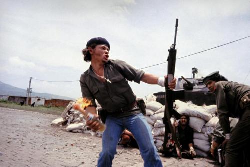 Sandinistas at the walls of the Esteli National Guard headquarters. Esteli, Nicaragua, 1979.&nb