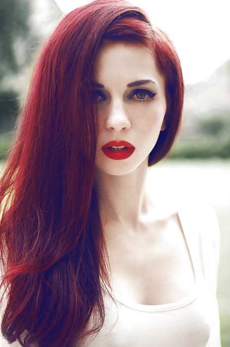 Red hair, red lipstick.