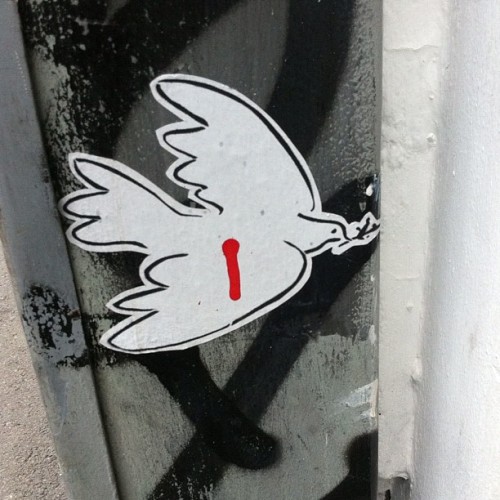 Peace has been wounded. :-( #sticker #streetart (Taken with Instagram)