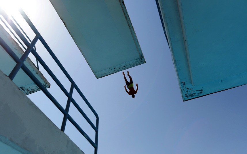 Sofia, Bulgaria
A man jumps into a pool to cool off during a heatwave. Temperatures in the Balkan country reached 40 degrees Celsius. (via Telegraph)