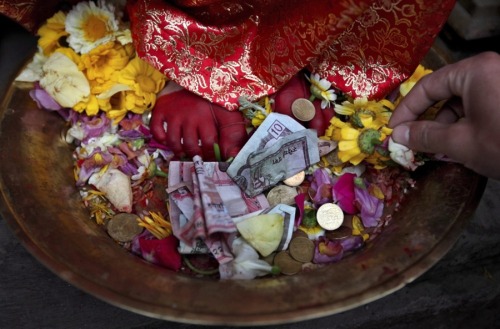 harvestheart: The Living Goddess Nepal’s Kumari (living goddess) Samita Bajracharya, aged 10, sits o