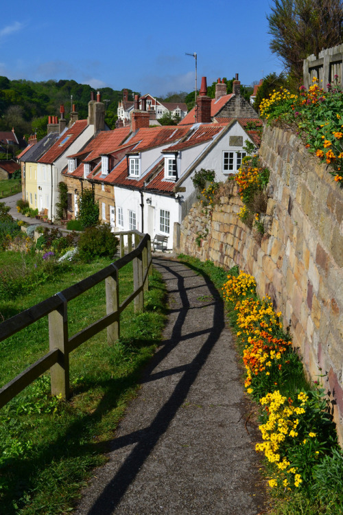 enchantedengland:   Sandsendis a ridiculously picturesque village lined with beach facing cottages