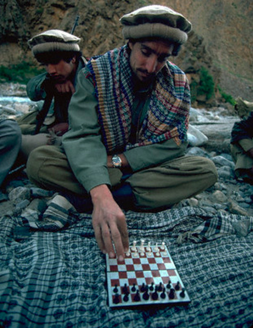 simply-war:  Original caption: Commander Massoud is very keen on chess. May 01, 1985. © Reza