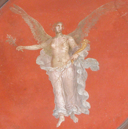 ancientart:Winged Victory with Cornucopia, Ancient Roman fresco from Pompeii, currently located at t