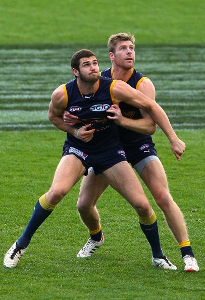 actionrigger:  Jack Darling and Beau Waters contest for a mark during a West Coast